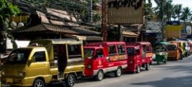 Tuk tuks parked on Patong's Beach Road